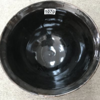 A David Leach stoneware bowl with brown glaze and incised panel decoration