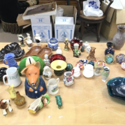 A collection of ceramics and glass ware including paperweights and a beswick horse.