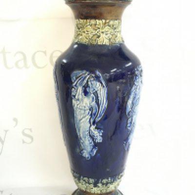 A Royal Doulton Lambeth vase decorated with classical figures, 43.5cm tall. This lot cannot be posted