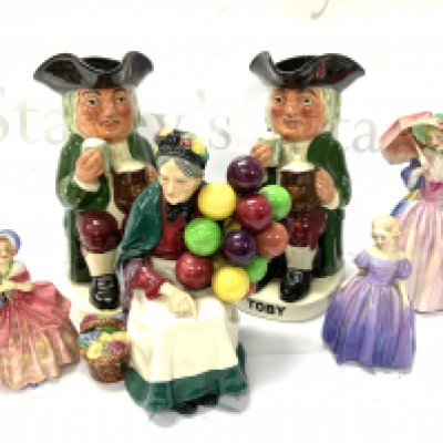 2 Royal Doulton Toby Ale jugs together with Royal Doulton The Old Balloon Seller HN1315, Cissie HN1809, Marie HN1370, Miss Demure HN1402 (D)