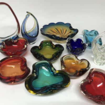 A collection of coloured mid 20th century glass trays.