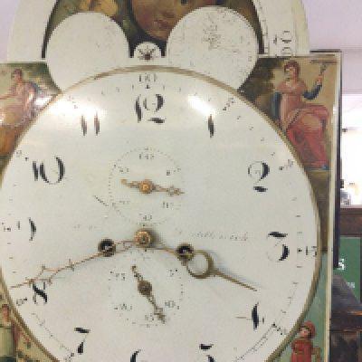 A mahogany long case clock the painted dial with moon roller Arabic numerals and second sub dial . NO RESERVE