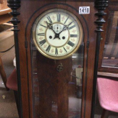 A mahogany wall clock with double weight the dial with Roman numerals. NO RESERVE