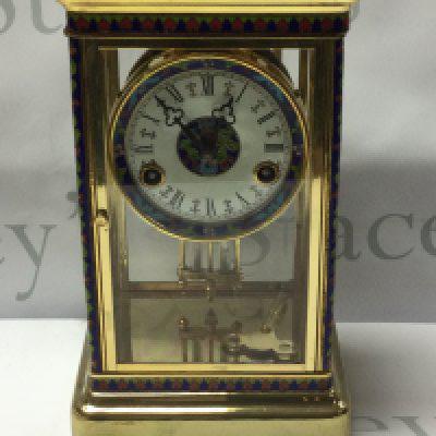 A good quality brass and cloisonne 4 glass clock with mercury pendulum, 29.5cm x 17.5cm x 13.5cm. (D, postage no offered for this lot).