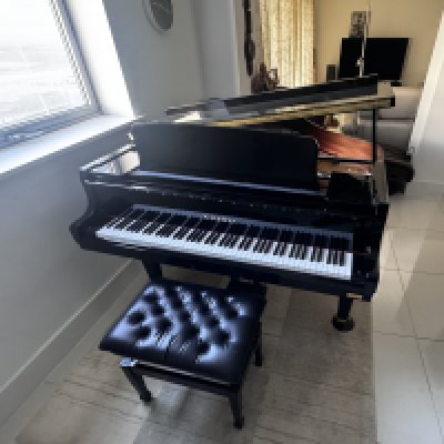 K.Kawai, 200l Black lacquered GL30 Aria model grand piano, AR2 serial number 2750346. 150CM X 166CM X 102CM (PLEASE BE AWARE THAT THIS ITEM IS SOLD IN SITU AND WOULD NEED TO BE COLLECTED BY PRIOR ARRANGEMENT ONLY).