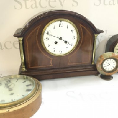 An Edwardian mahogany mantle clock with inlaid design 12x34x27.5cm, A Matthew Norman marble clock and other clocks. This lot cannot be posted