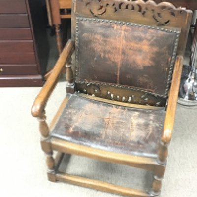 A vintage occasional chair that converts to a table. Approximately 54cm wide and 72cm tall. Postage D