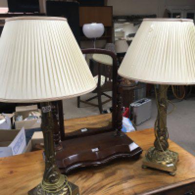 A pair of brass table lamps with stylised acanthus leaves square bases and white shades total height 84cm