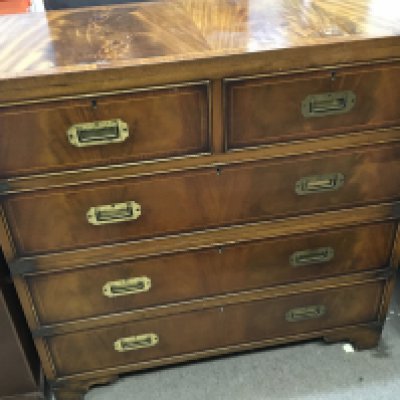 A Campaign style Mahogany chest of drawers the rectangular top above two short and three long drawers with brass fittings inset handles and side handles. 92x41cm