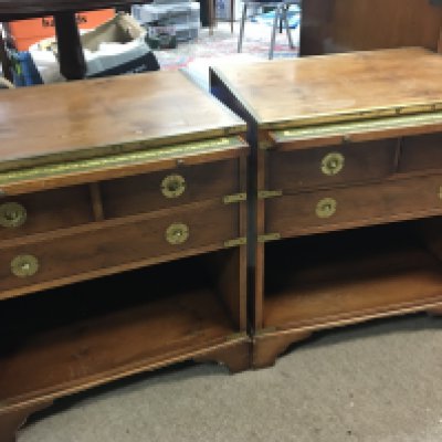 A pair of Yew wood campaign style cabinets with inset brass fittings and tooled leather brushing slides (2)