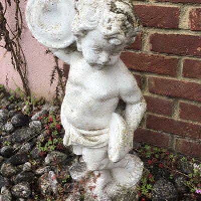 a collection of six composition, neoclassical style garden, ornaments in the form of putti of various design. Some damage. (6)