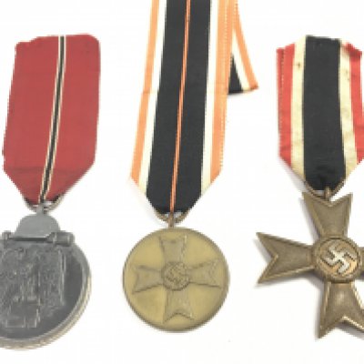 WW2 Third Reich medals including a War Merit medal, War Merit Cross, Eastern Front medal. Postage category A