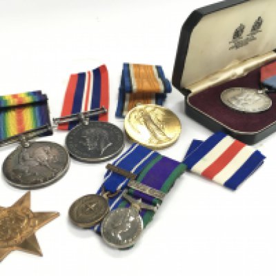 A Collection of WW1 and 2 medals including a WW1 war medal and Victory medal presented to 7280 Pte W Hardie 16-Lond.R, another war medal presented to 57160 Pte J T Merphy. R.A.M.C, an Italy star, Former Yugoslavia & Northern Ireland miniature medals and a faithful service medal presented to Charles Douglas Towns. Postage category B