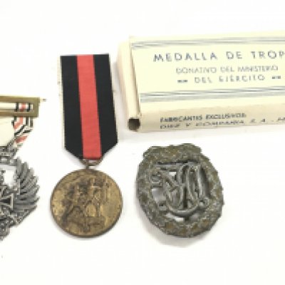 A Third Reich Spanish Blue Division medal, German 1938 Sudetenland Medal and a DRL German sports badge. Postage category A