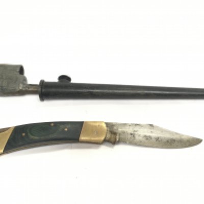 A vintage lock knife and a British army vintage pig sticker bayonet