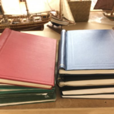 A Collection of nine stamp albums containing world stamps from Queen Victoria to Elizabeth II mostly used stamps. An interesting mixed collection. Postage category C