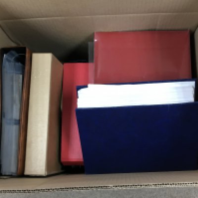 Three large boxes containing albums of postcards mixed subjects. (3)