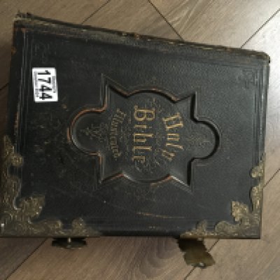 A leather and brass bound Bible