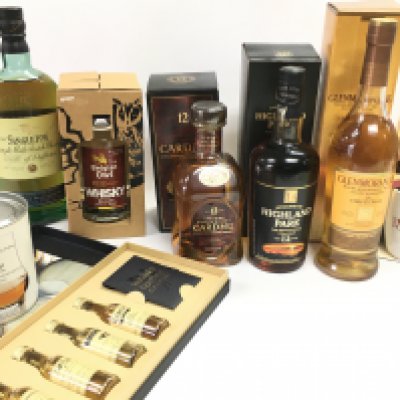 A Collection of whiskeys including Cardhu 12 year single malt scotch whiskey, Highland park 12 year single malt scotch whisky, Glenmorangie, The Belgian owl, The Singleton single malt scotch whisky etc. this lot cannot be posted