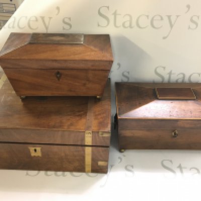 Two mahogany tea caddies and a writing slope. Postage category C