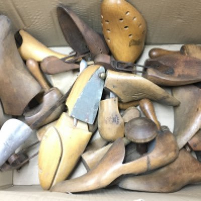 A collection of shoe lasts. Postage C