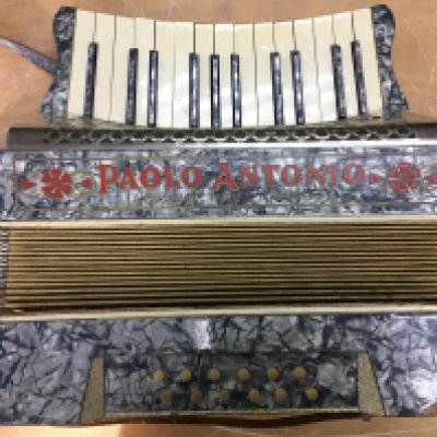 A Paolo Antonio accordion. Postage C