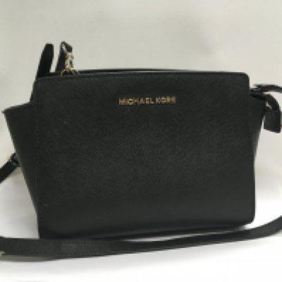 A black Michael Kors handbag