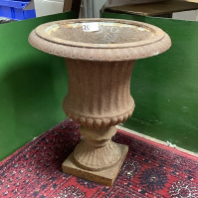 A small cast iron garden urn. 36cm