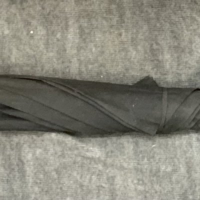 A vintage eastern parasol with white metal parasol (D)