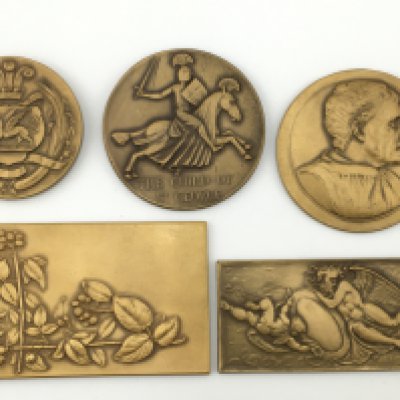 Bronze plaques from the Aston School of Art. 4 to 8cm wide. Postage category A