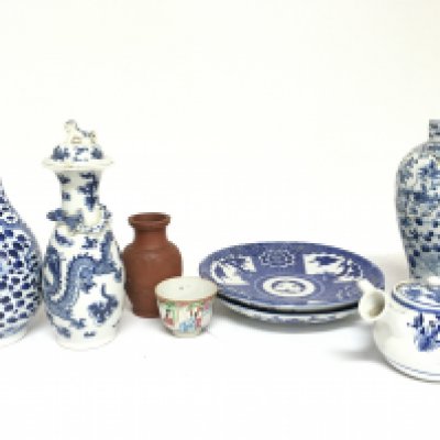 A Collection of Chinese ceramics including blue and white plates and vases with dragon decoration. Damage and restoration seen.