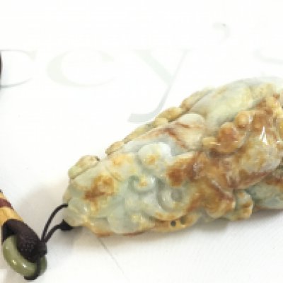 A Chinese carved Jade pebble , 9cm long this lot cannot be posted