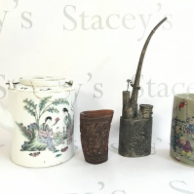 A collection of Chinese items including an opium pipe, famille rose brush pot, teapot (damaged), carved ox horn libation cup. This lot cannot be posted