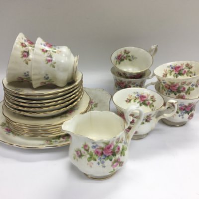 A Royal Albert tea service in Moss Rose pattern. Shipping category D.