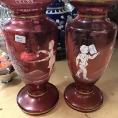 A pair of Victorian style cranberry vases . NO RESERVE