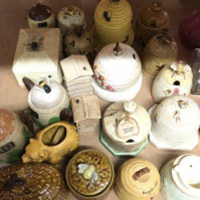 A collection of ceramic honey pots preserve jars and covers. NO RESERVE