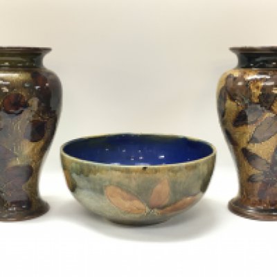 A pair of Royal Doulton autumnal foliage vases and a bowl. Bowl 20cm in diameter, vase 22cm tall. No obvious damage or restoration. This lot cannot be posted. NO RESERVE