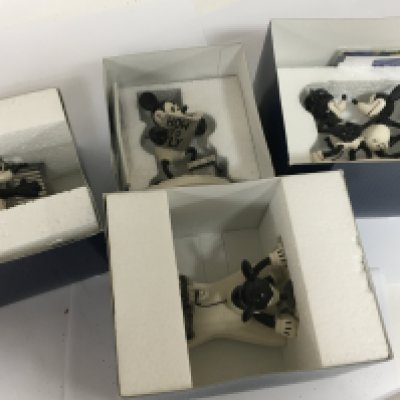 Four boxed Disney Show Case figures Mickeys one man band all in black and white glaze with limited edition COA. (4)
