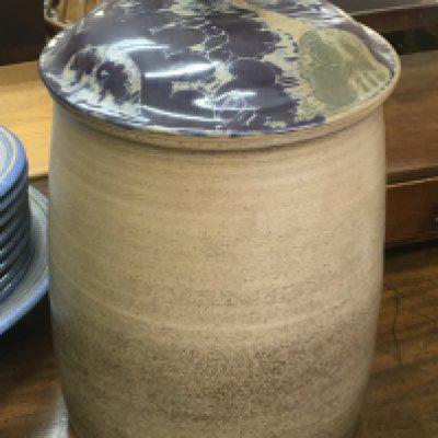 A ceramic stone ware barrel with a removal top. 36cm tall approximately. This lot cannot be posted NO RESERVE