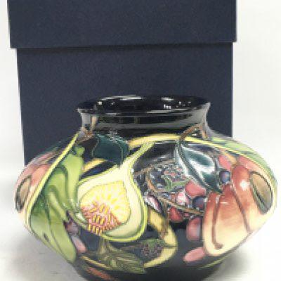 A Boxed Moorcroft Queens Choice vase , 11cm tall. No obvious damage or restoration. This lot cannot be posted