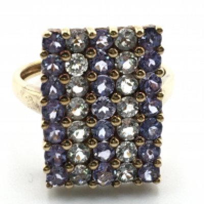 A 9 carat gold tanzanite set ring, size O. 3.8g Postage category A