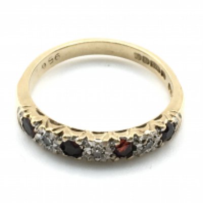 A 9 carat diamond and sapphire ring, 2.5g size N. Postage category a