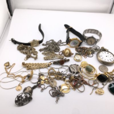 A mixed collection of costume jewellery including a silver ring, brooches, watches etc