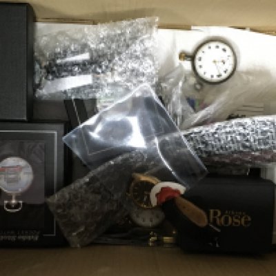 A mixed collection of watches including a silver cased pocket watch (seen working), Silver hallmarked bangle, Lorus watch, Eddie Stobart pocket watches etc. This lot cannot be posted