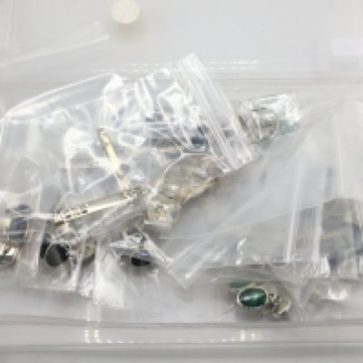 A collection of new silver and stone set cufflinks and tie pins. Postage category A