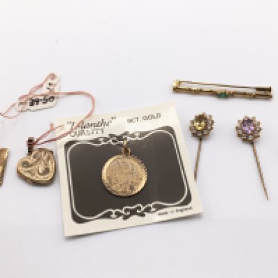 Two 9ct gold pendants with a small lockets and stick pins etc.