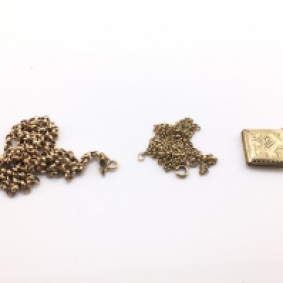 Two 9ct gold chains and a gold plated locket. 6.3g without pendants. Postage B