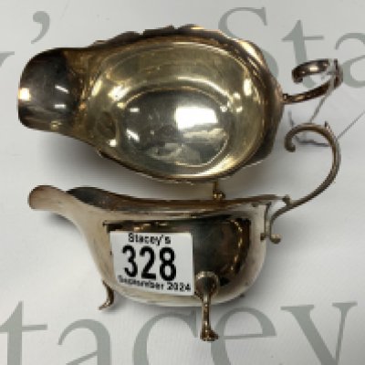 A pair of Aspreys hallmarked silver Gravy boats, Birmingham 1916. 184g.