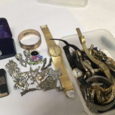 A collection of costume jewellery watches a small silver mount bible and other oddments.