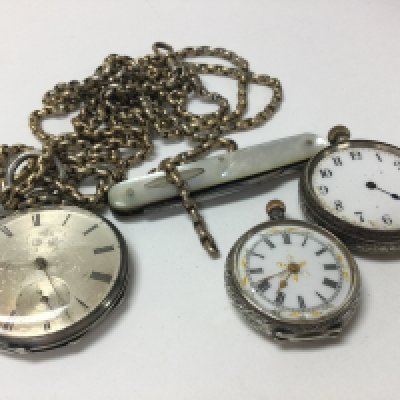 A small collection of pocket watches and other items including a pearl effect pen knife and a watch chain.